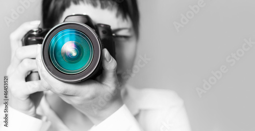 Photo: Woman photographer with camera Woman photographer with camera