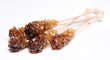 Candy sugar on a stick over white background