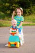 Photo: Two brothers, one with Down syndrome, have fun playing. Two brothers, one with Down syndrome, have fun playing.