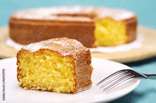 Photo: close up of a piece of cake with icing sugar close up of a piece of cake with icing sugar