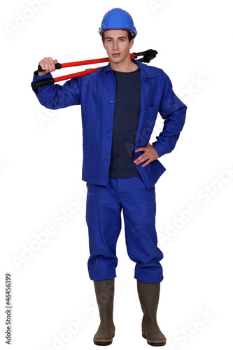 Photo: young worker posing with bolt cutters young worker posing with bolt cutters