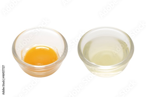 Photo: separated egg white and yolk separated egg white and yolk