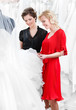 Girl hesitates about wedding gown
