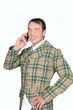 man dressed like an English aristocrat talking on his phone