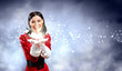 Portrait of girl wearing santa claus clothes