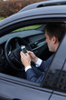young attractive man young man in the car