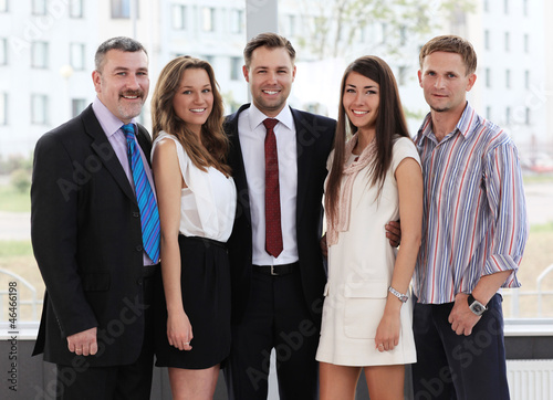 Photo: Closeup portrait of a successful business team laughing together Closeup portrait of a successful business team laughing together