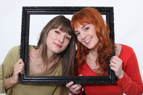 Photo: Women posed in a frame Women posed in a frame