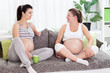 Two pregnant female friends spending time together