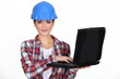 young craftswoman with laptop