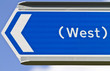 Sign Pointing West