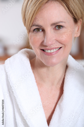 Photo: Portrait of a woman wearing a bathrobe Portrait of a woman wearing a bathrobe