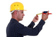 Man watching his measuring tape