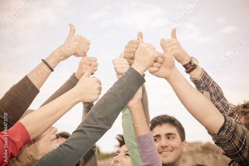 Photo: College Students with Thumbs Up College Students with Thumbs Up