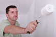 Painter with roller