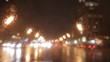 car window rain night background defocused in motion