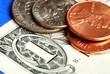 Photo: Coins and dollar bill concepts of money investing and wealth Coins and dollar bill concepts of money investing and wealth