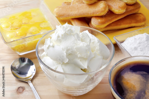Photo: Mascarpone in glass bowl, ingredients for tiranisu Mascarpone in glass bowl, ingredients for tiranisu