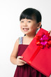 Asian child with red gift box