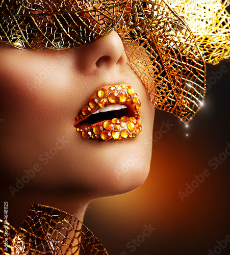 Photo: Luxury Golden Makeup. Beautiful Professional Holiday Make-up Luxury Golden Makeup. Beautiful Professional Holiday Make-up