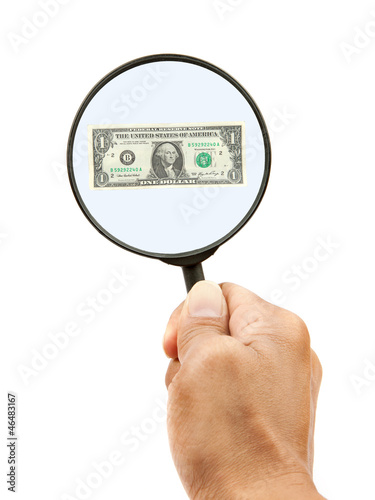Photo: dollars bank note and hand holding magnificent dollars bank note and hand holding magnificent