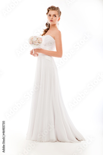 Photo: Beautiful woman with bunch of flowers, white wedding dress Beautiful woman with bunch of flowers, white wedding dress