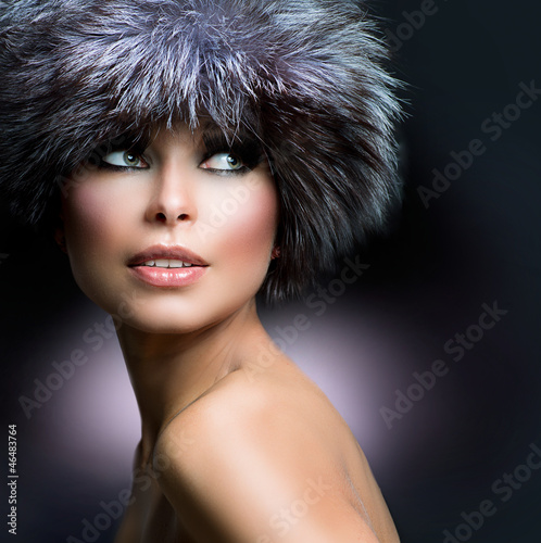 Photo: Fashion. Beautiful Girl in Fur Hat. Winter Woman Fashion. Beautiful Girl in Fur Hat. Winter Woman