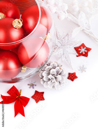 Photo: christmas red ball with festive tinsel isolated on white christmas red ball with festive tinsel isolated on white