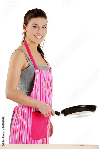 Photo: Smiling caucasian female dressed in apron Smiling caucasian female dressed in apron