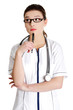 Thoughtful young female doctor with a pen