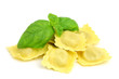Fresh ravioli with green basil on white