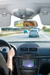 Foto: Young woman driving by car on motorway Young woman driving by car on motorway