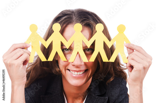 Photo: Woman with paper cut people Woman with paper cut people