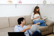 Young couple talking in the living room