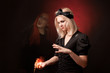 Witch sees a terrifying ghost on black background