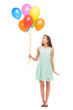Woman holding a bunch of balloons