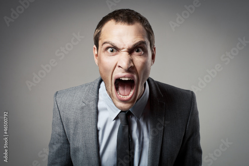 Photo: Angry businessman shouting Angry businessman shouting