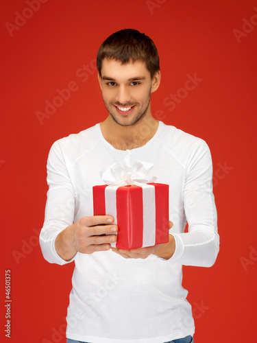 Photo: handsome man with a gift handsome man with a gift