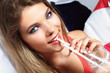 fresh portrait of an amazing girl that drink a cocktail