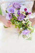 Photo: Bride with bouquet, closeup Bride with bouquet, closeup