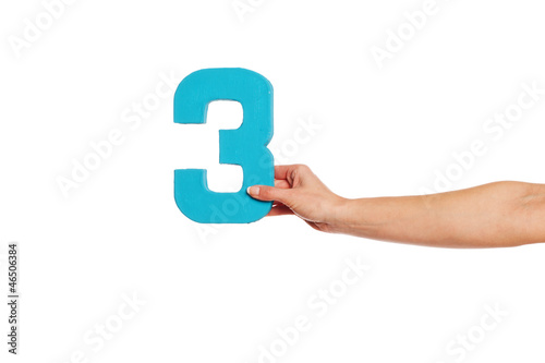 Photo: hand holding up the number three from the right hand holding up the number three from the right