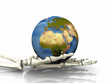 the earth in a skeleton hand