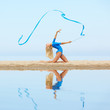 Photo: girl training on beach girl training on beach