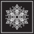 White ornamental snowflake in square frame isolated on black