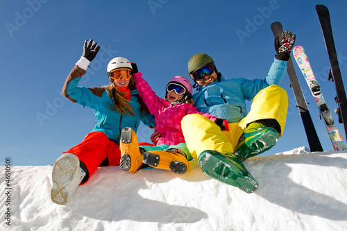 Photo: Ski, snow, sun and winter fun - happy family ski team Ski, snow, sun and winter fun - happy family ski team