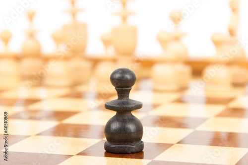 Photo: Black chess pawn isolated Black chess pawn isolated