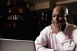 African guy at laptop
