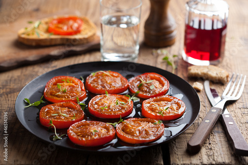 Photo: baked tomatoes with herbs and olive oil baked tomatoes with herbs and olive oil