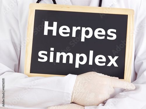 Photo: Doctor shows information: herpes simplex Doctor shows information: herpes simplex