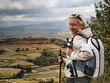 Photo: Woman hiking on top of high cliff Woman hiking on top of high cliff